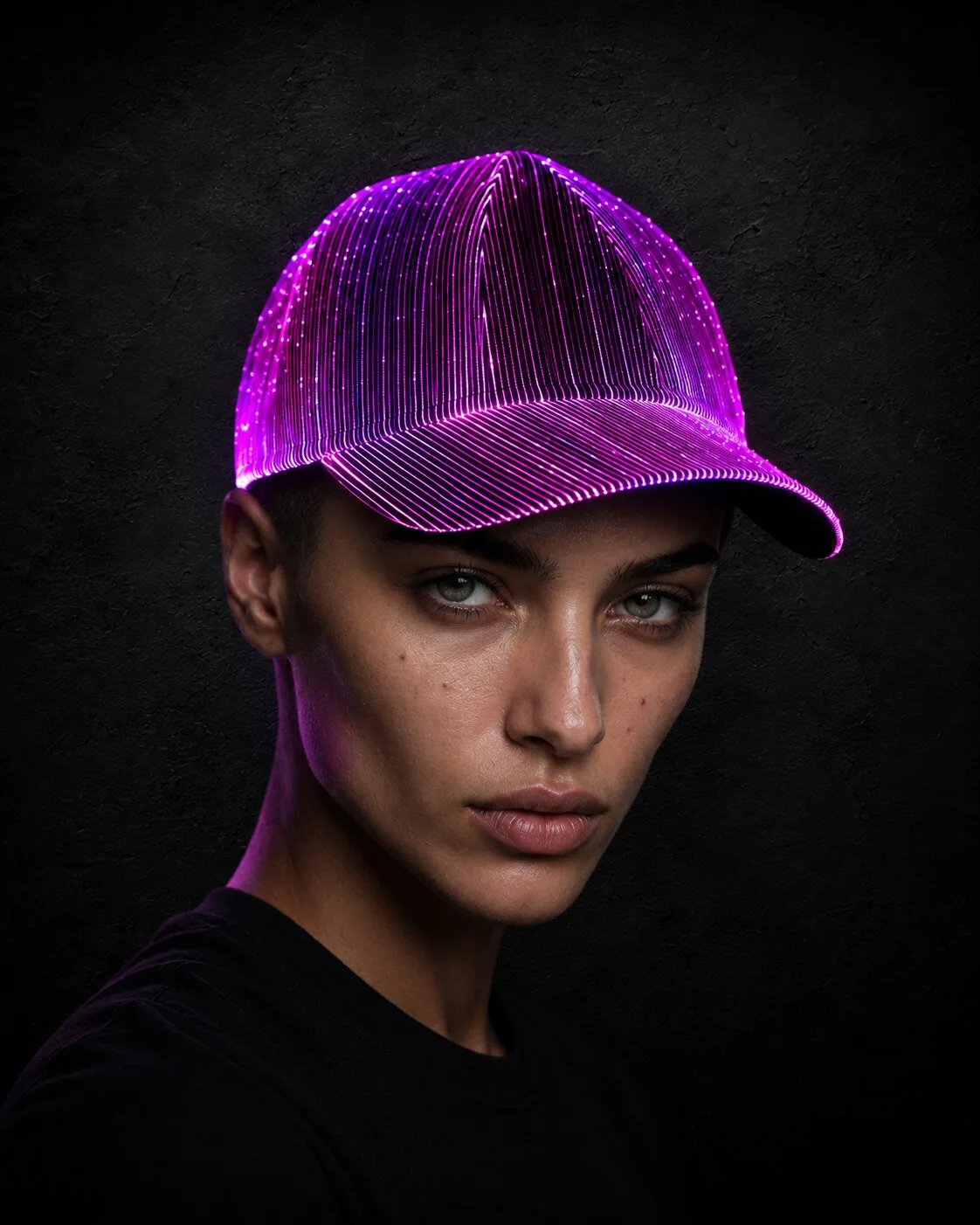 Woman wearing a purple glowing LED hat