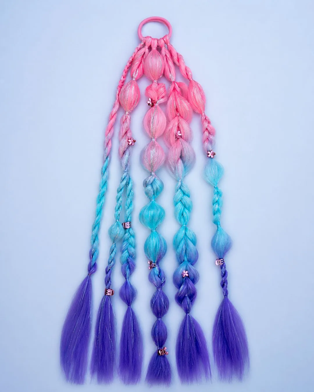 Extra-long LED festival fairy hair extension lit up in pink and aqua
