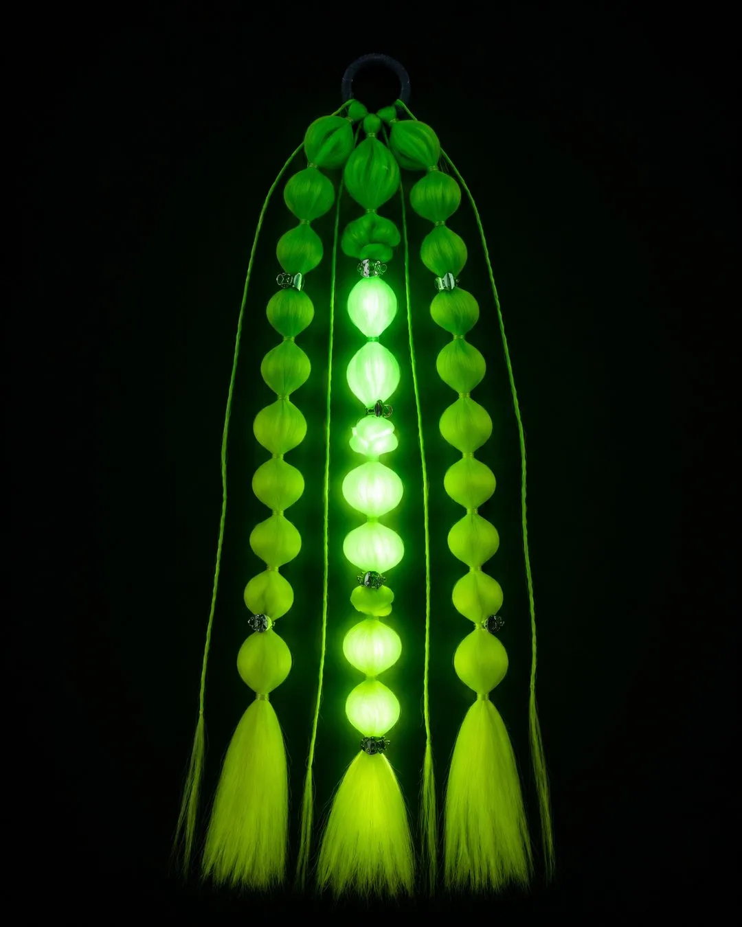 Light-up neon green festival hair, glowing bubble-braid ponytail