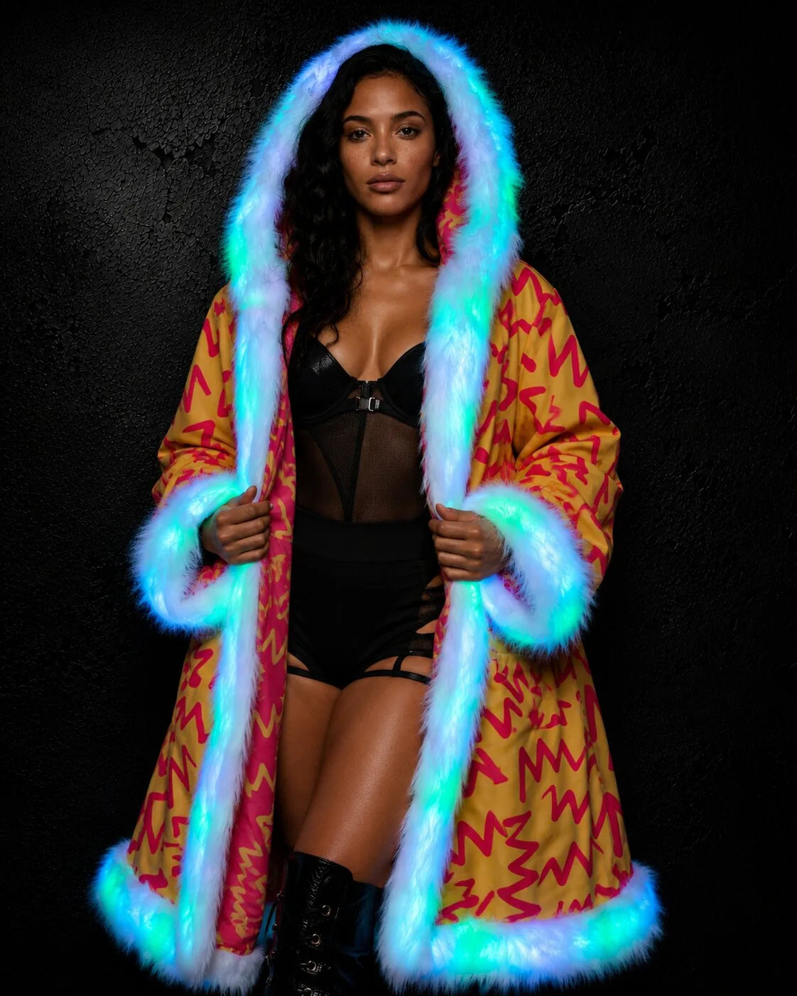 Woman in a light-up red and yellow LED fur coat, worn open