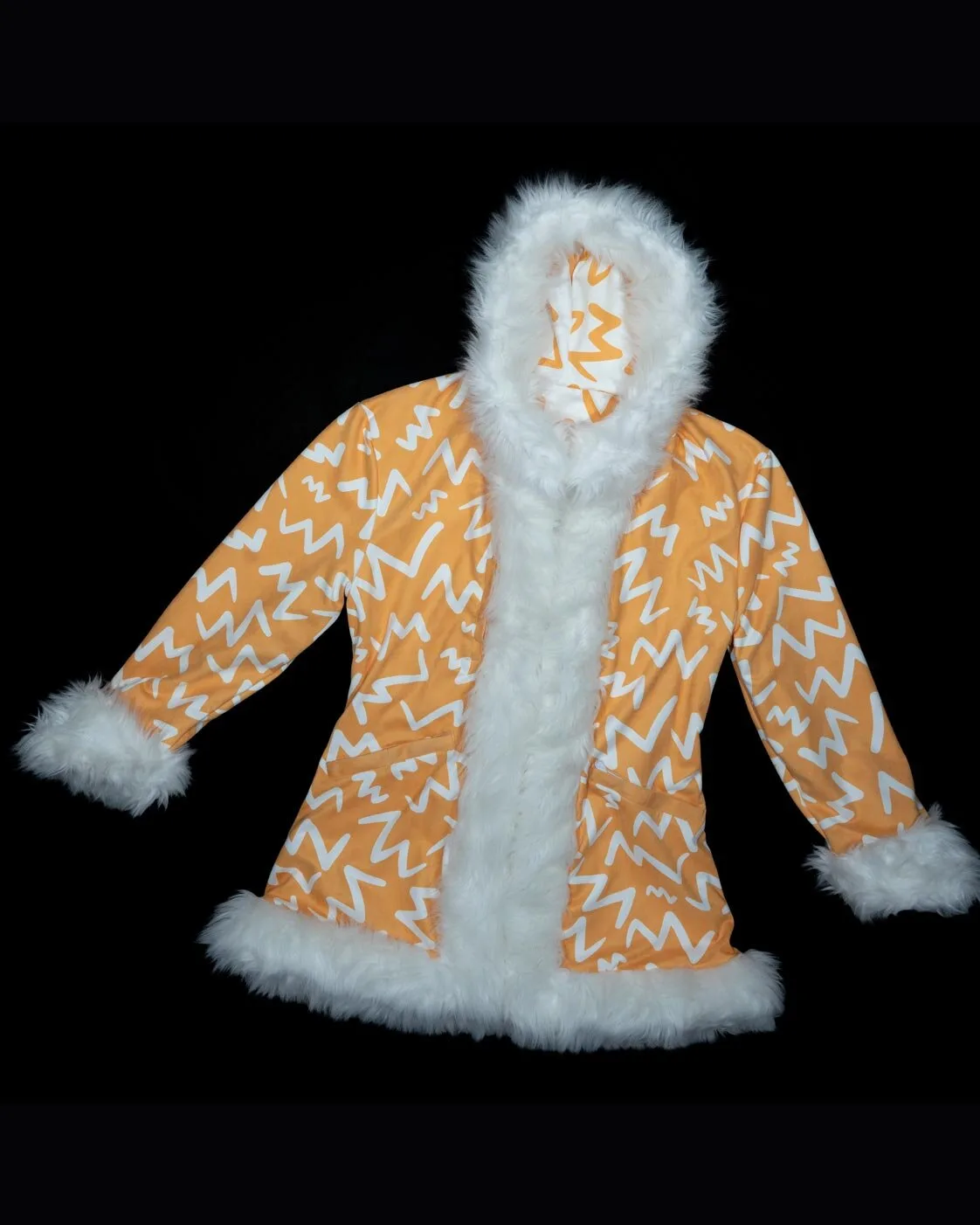 Orange and white LED fur coat, unlit daytime view showing the print