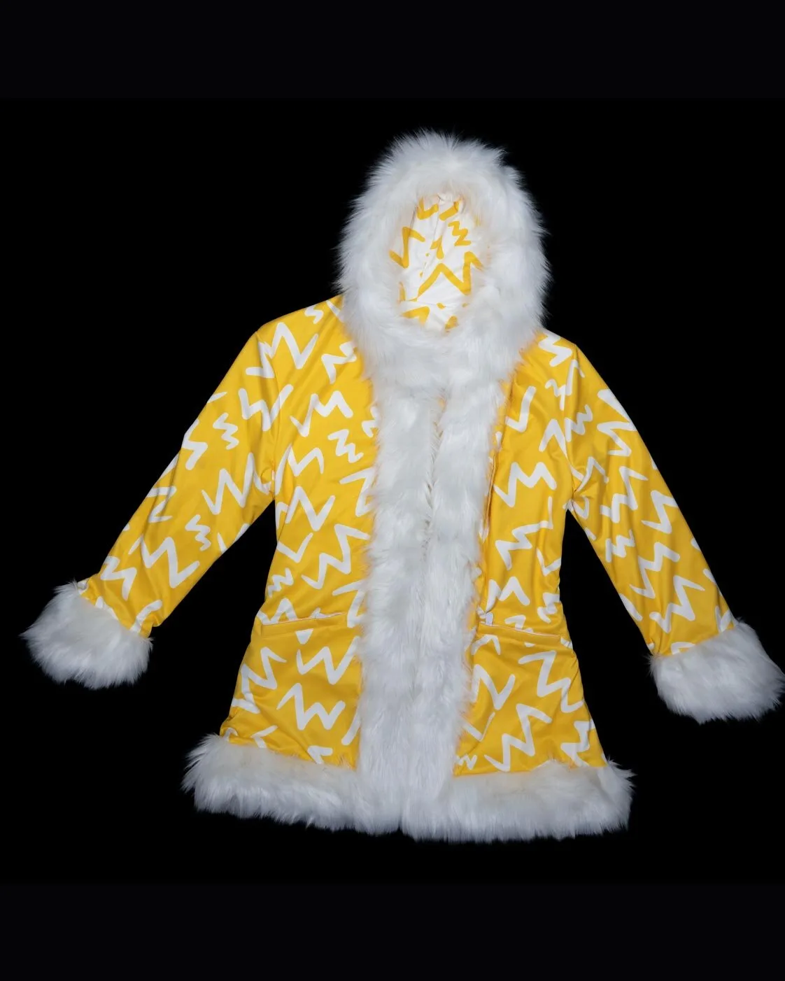 Yellow and white LED fur coat, unlit daytime view showing the print