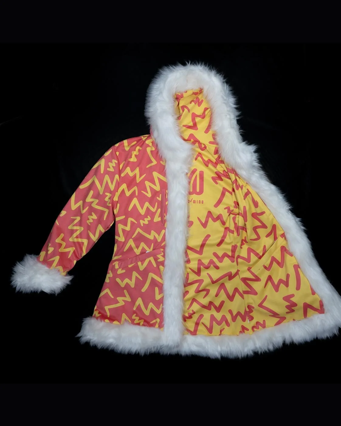 Reversible LED fur coat, red-and-orange print side, unlit